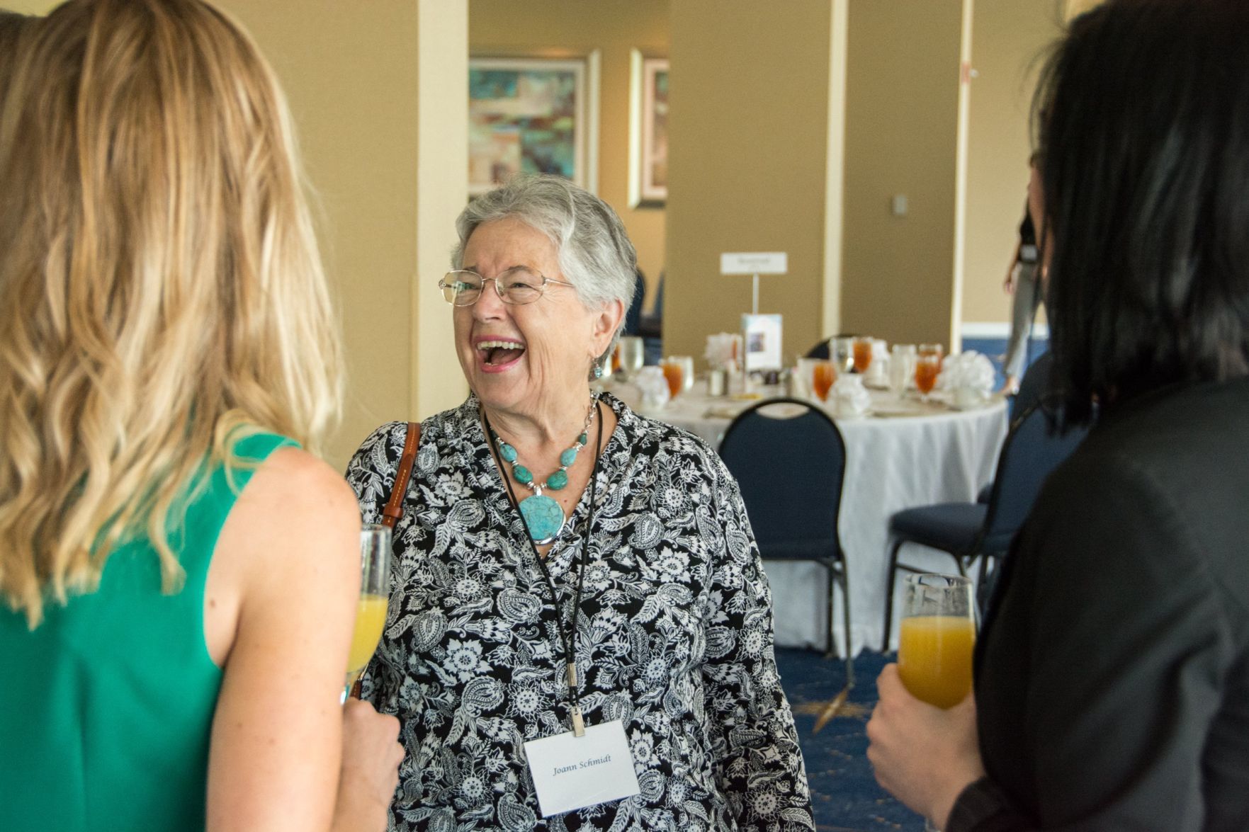 Guests chat before the luncheon